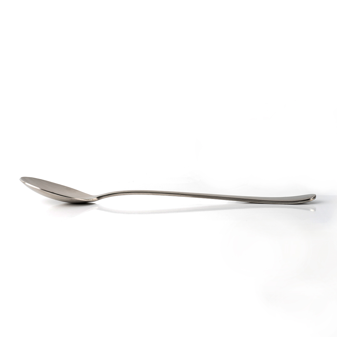 Six spoons with rounded handles are spread out.