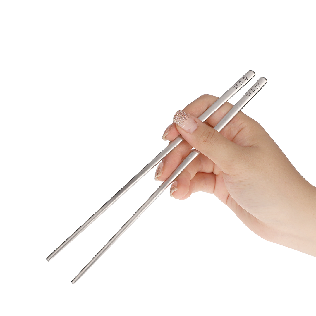 The chopsticks are held in the correct way.